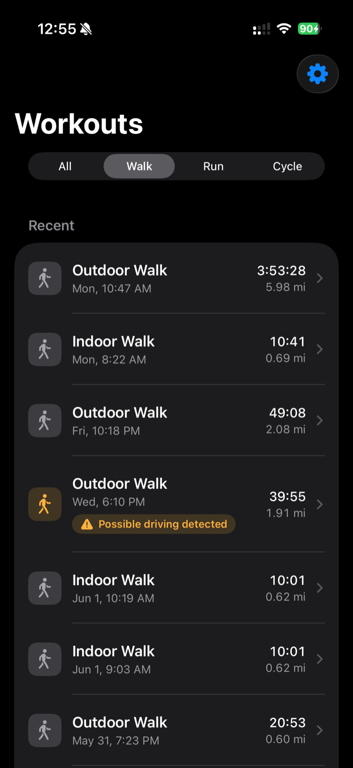Workout list with a walk flagged ‘Possible driving detected’